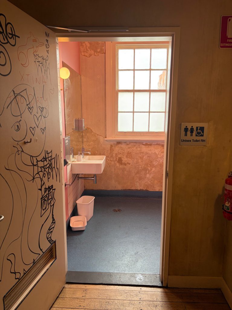 Entrance to the accessible unisex toilet. Doorway width: 905 mm.